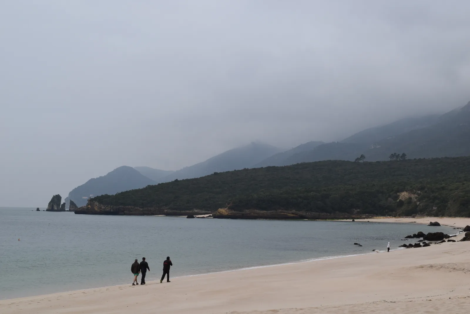 The coast of Serra da Arrábida — turquoise coves at the foot of maquis-covered cliffs