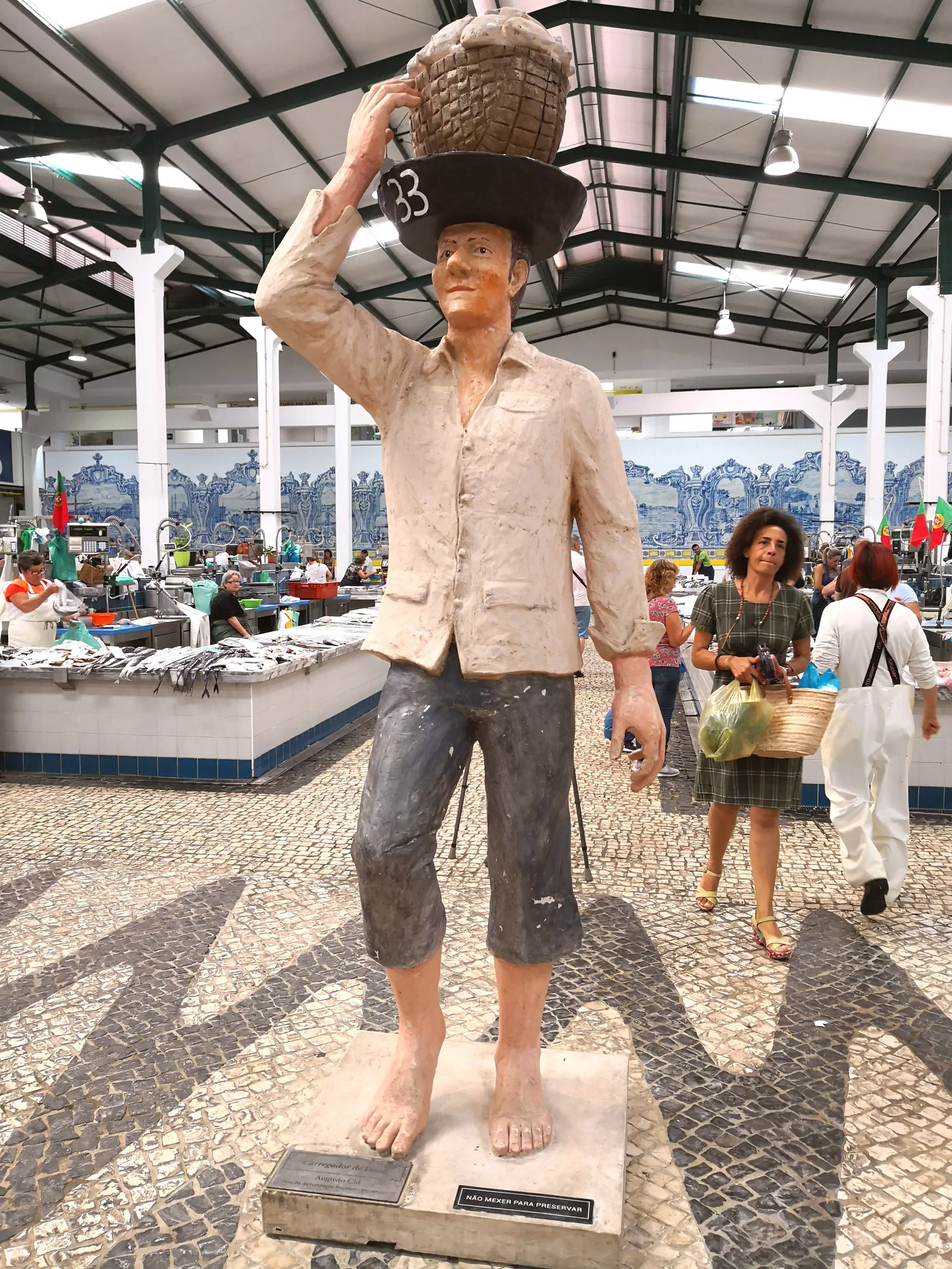 Fish porter hat at Mercado do Livramento — symbol of the fish trade